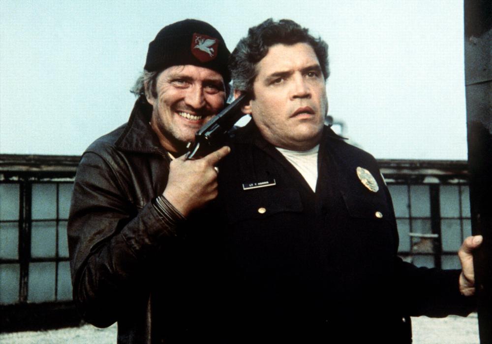 POLICE ACADEMY, G.W. Bailey (right), 1984, (c) Warner Brothers