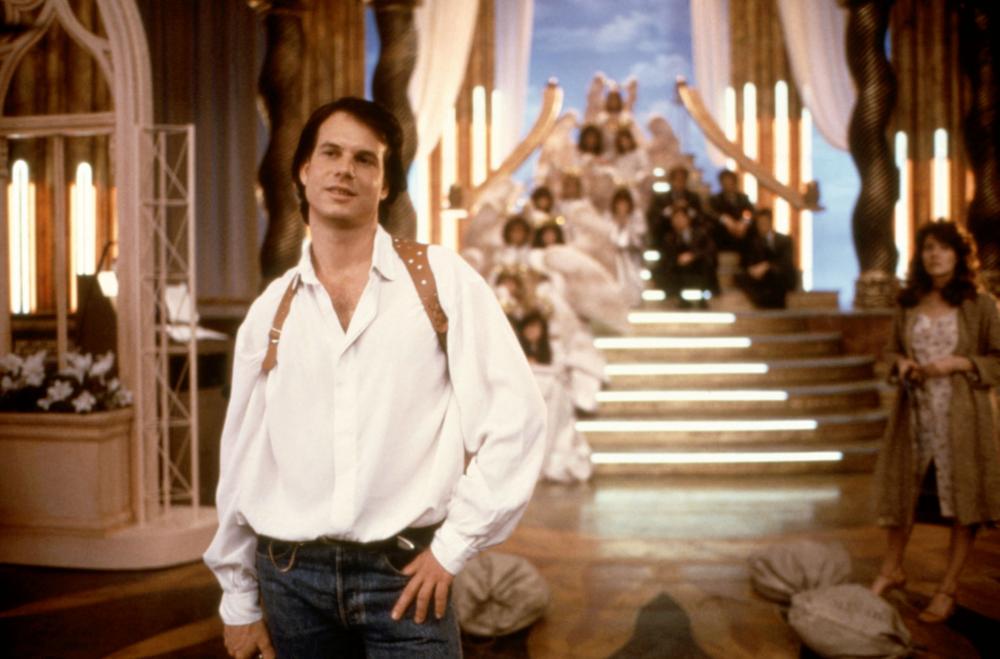 PASS THE AMMO, Bill Paxton (foreground left), Linda Kozlowski (far right), 1988. ©New Century Vista Film